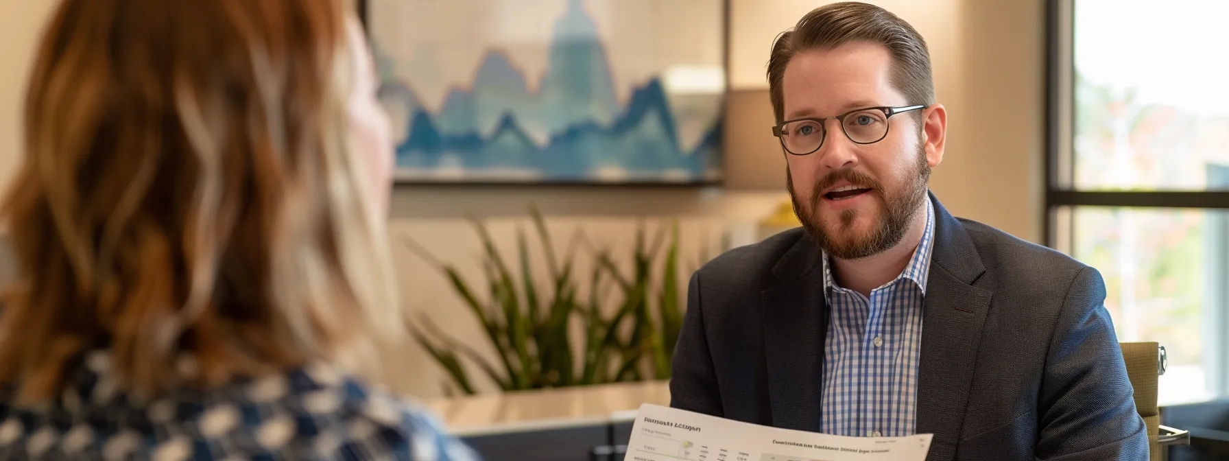 a confident financial advisor presents a detailed chart in a modern nashville office, highlighting fiduciary responsibilities and transparent bookkeeping practices to an engaged client, illuminated by sleek overhead lighting.