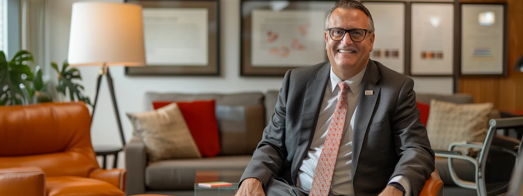 a modern nashville office setting features a confident advisor engaging in a discussion with clients, surrounded by sleek furniture and framed certifications, embodying professionalism and local market expertise.